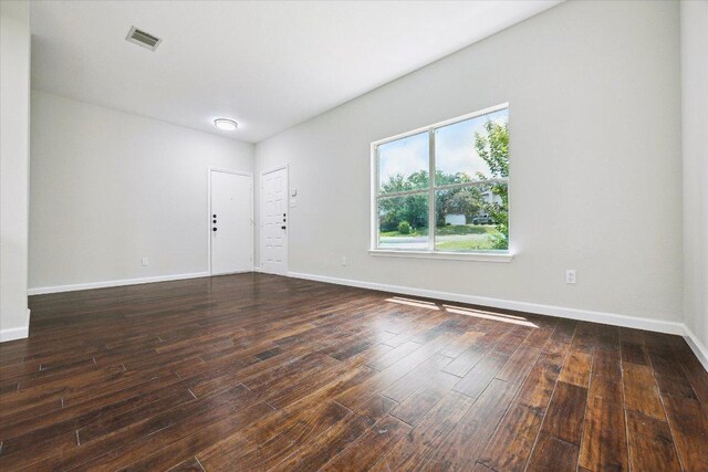 15405 Montoya Cv, Austin, TX 78717 - spare room featuring wood finished floors and baseboards