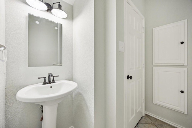 15405 Montoya Cv, Austin, TX 78717 - bathroom with tile patterned floors and a sink