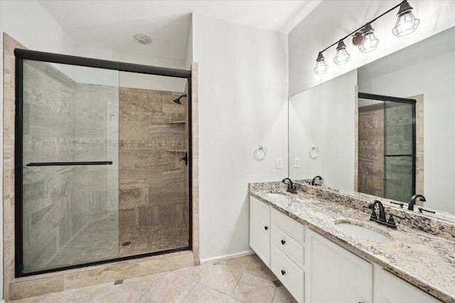 15405 Montoya Cv, Austin, TX 78717 - full bath with a shower stall, double vanity, and baseboards