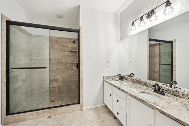 15405 Montoya Cv, Austin, TX 78717 - full bathroom featuring a shower stall and double vanity