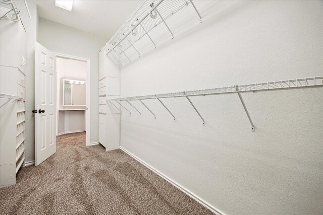 15405 Montoya Cv, Austin, TX 78717 - walk in closet featuring carpet flooring