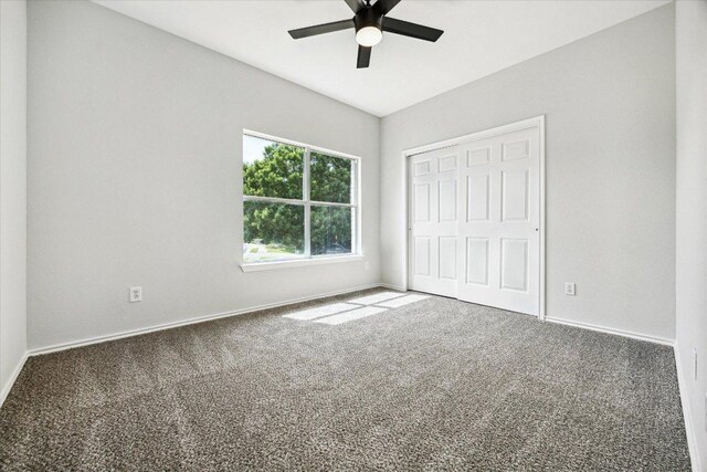 15405 Montoya Cv, Austin, TX 78717 - unfurnished bedroom with carpet floors, a closet, and ceiling fan