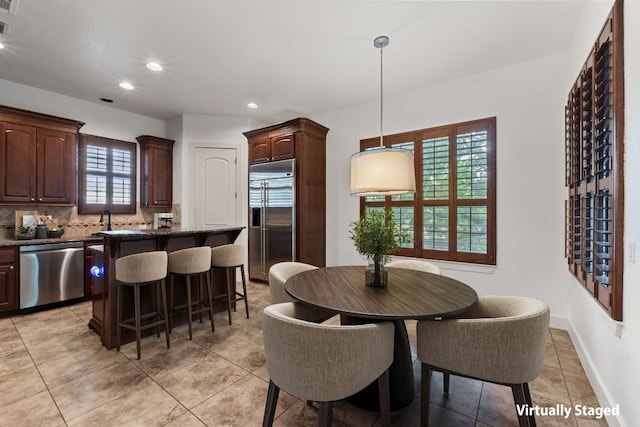 1036 Liberty Park Dr Unit 3, Austin, TX 78746 - dining area with recessed lighting and light tile patterned floors
