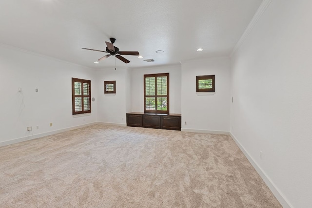 1036 Liberty Park Dr Unit 3, Austin, TX 78746 - unfurnished room featuring crown molding, plenty of natural light, light colored carpet, a ceiling fan, and recessed lighting
