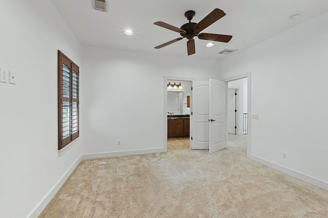 1036 Liberty Park Dr Unit 3, Austin, TX 78746 - unfurnished bedroom featuring light colored carpet, recessed lighting, ensuite bathroom, and ceiling fan