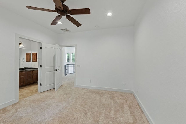 1036 Liberty Park Dr Unit 3, Austin, TX 78746 - unfurnished bedroom with light carpet, recessed lighting, ensuite bathroom, and ceiling fan