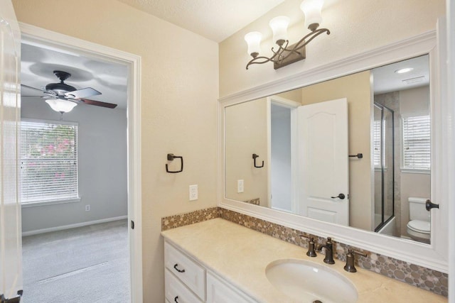 6611 Haughton Dr, Spring, TX 77389 - full bath with toilet, vanity, a shower with shower door, and a chandelier