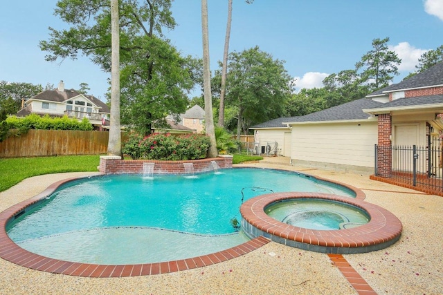 6611 Haughton Dr, Spring, TX 77389 - view of pool featuring a fenced backyard and a pool with connected hot tub