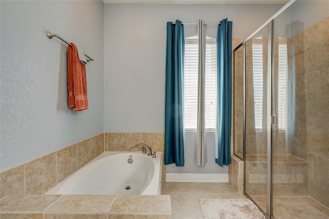 3107 Magnolia Mnr, New Braunfels, TX 78130 - bathroom with a shower stall, a garden tub, and tile patterned floors