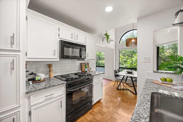 3840 Far W Blvd Unit 213, Austin, TX 78731 - kitchen featuring black appliances, white cabinetry, decorative backsplash, light stone counters, and recessed lighting