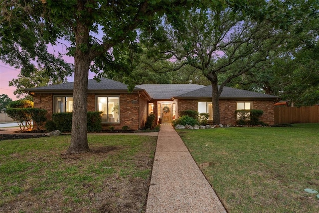 10701 Culberson Dr, Austin, TX 78748 - view of front facade with brick siding and roof with shingles
