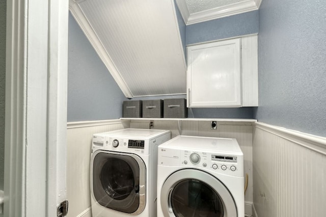 1506 Spiderlily Vw, Cedar Park, TX 78613 - laundry room with washing machine and dryer, crown molding, cabinet space, wainscoting, and a textured wall