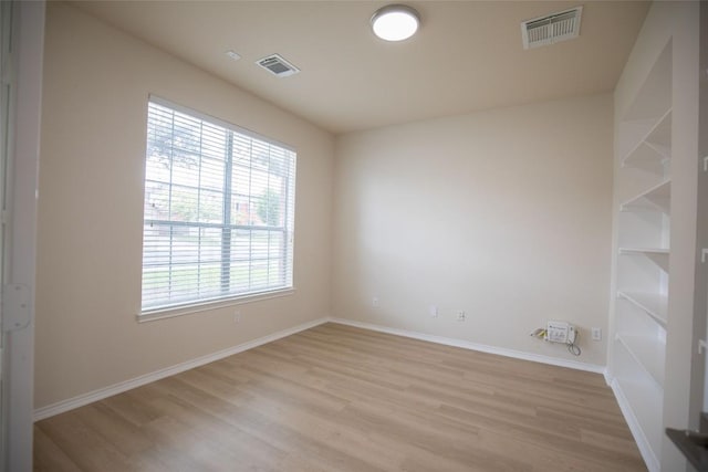 2308 Lou John St, Austin, TX 78727 - unfurnished room with light wood-style floors