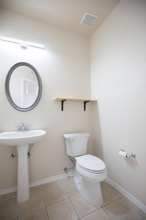 2308 Lou John St, Austin, TX 78727 - half bath with tile patterned flooring