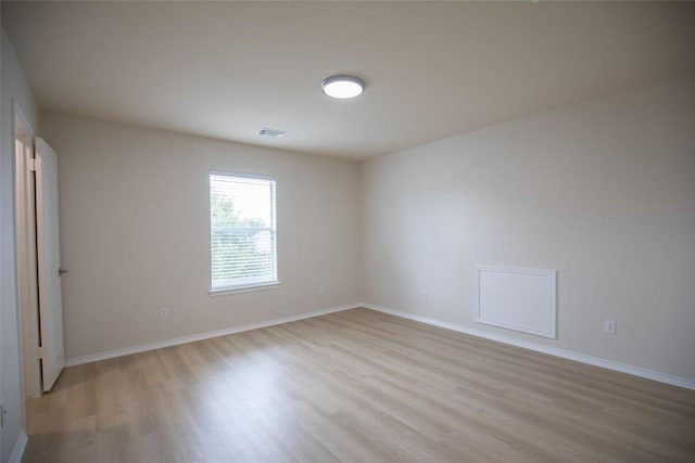 2308 Lou John St, Austin, TX 78727 - empty room featuring light wood finished floors and baseboards