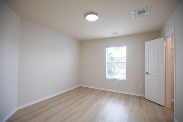 2308 Lou John St, Austin, TX 78727 - empty room featuring light wood-type flooring and baseboards
