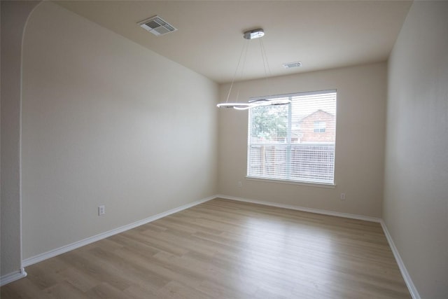 2308 Lou John St, Austin, TX 78727 - empty room featuring light wood-style flooring and baseboards