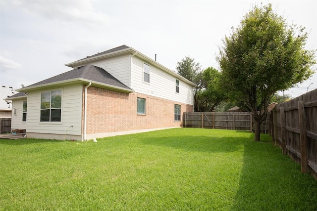 2308 Lou John St, Austin, TX 78727 - rear view of house with brick siding