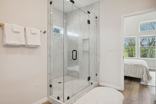 800 Newcastle Dr, Austin, TX 78745 - ensuite bathroom featuring wood finished floors and a marble finish shower