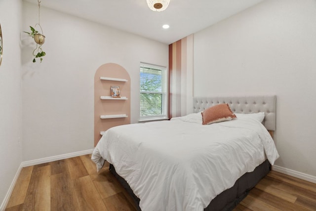 800 Newcastle Dr, Austin, TX 78745 - bedroom with wood finished floors and recessed lighting