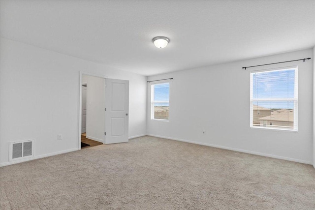 336 Wonderful Life Way, Jarrell, TX 76537 - empty room with carpet flooring and baseboards