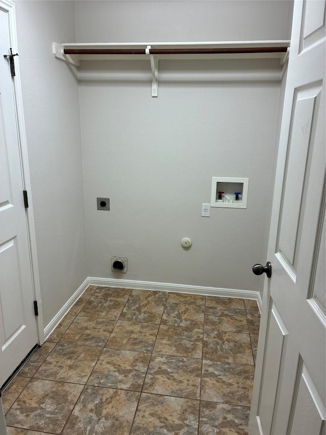 7702 Squirrel Hollow Dr, Georgetown, TX 78628 - laundry area with electric dryer hookup, hookup for a washing machine, gas dryer hookup, and baseboards