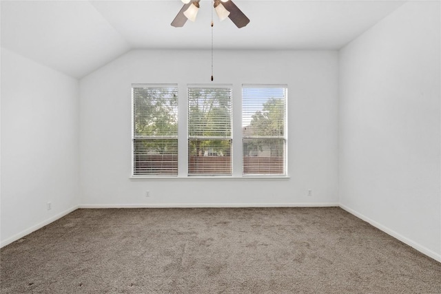 250 Maeves Way, Austin, TX 78737 - empty room with plenty of natural light, carpet, a ceiling fan, vaulted ceiling, and baseboards