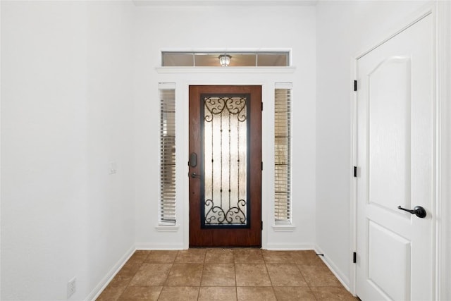 250 Maeves Way, Austin, TX 78737 - foyer entrance featuring baseboards and light tile patterned floors
