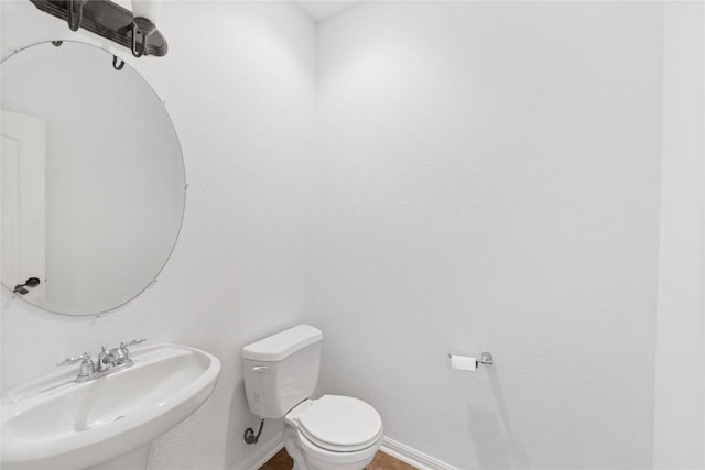 250 Maeves Way, Austin, TX 78737 - half bath featuring toilet, a sink, and baseboards