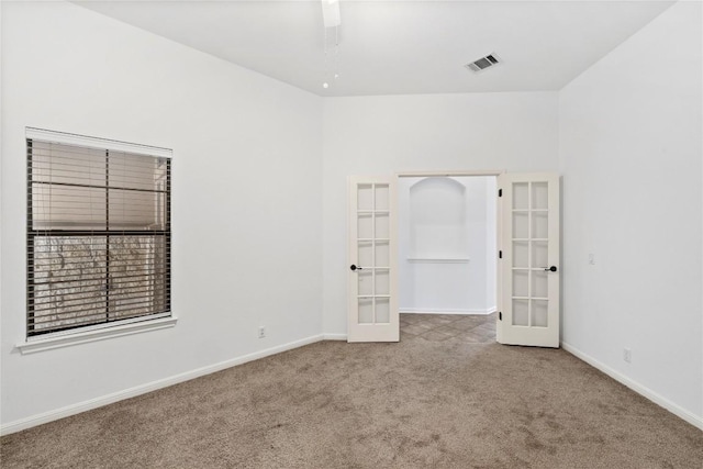 250 Maeves Way, Austin, TX 78737 - carpeted spare room with french doors and baseboards