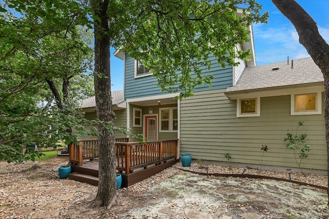 10908 Railway Ln Unit 76, Austin, TX 78717 - rear view of property featuring a deck and roof with shingles