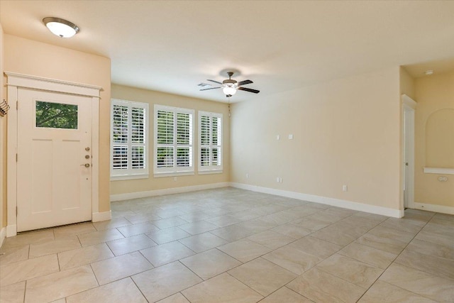 10908 Railway Ln Unit 76, Austin, TX 78717 - foyer entrance featuring a ceiling fan, baseboards, and light tile patterned flooring