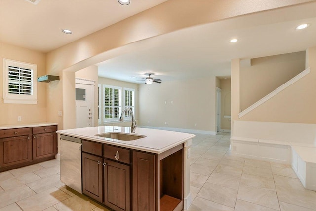10908 Railway Ln Unit 76, Austin, TX 78717 - kitchen with a sink, dishwasher, light countertops, a ceiling fan, and a center island with sink