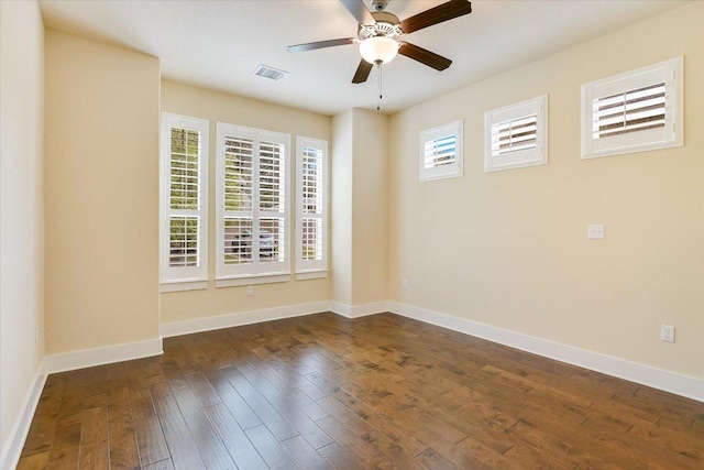 10908 Railway Ln Unit 76, Austin, TX 78717 - empty room featuring a ceiling fan, dark wood-type flooring, and baseboards