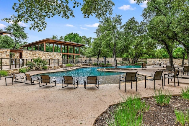 10908 Railway Ln Unit 76, Austin, TX 78717 - community pool featuring a patio area