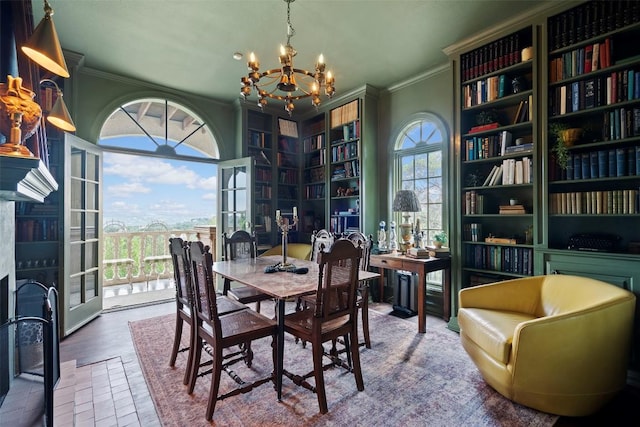 6203 Ledge Mountain Dr, Austin, TX 78731 - dining space with crown molding and a chandelier