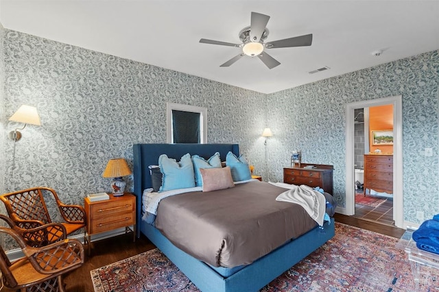 6203 Ledge Mountain Dr, Austin, TX 78731 - bedroom with wood finished floors, wallpapered walls, and a ceiling fan