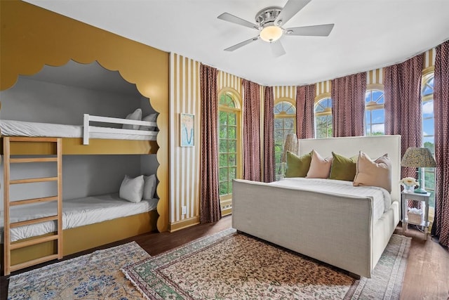 6203 Ledge Mountain Dr, Austin, TX 78731 - bedroom with wood finished floors and a ceiling fan