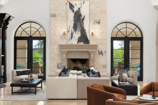 4256 Fischer Store Rd, Wimberley, TX 78676 - living room featuring french doors, plenty of natural light, and a towering ceiling
