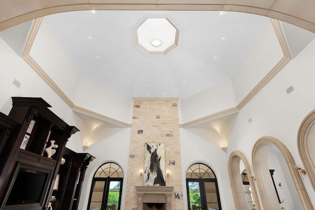 4256 Fischer Store Rd, Wimberley, TX 78676 - unfurnished living room featuring a high ceiling and healthy amount of natural light