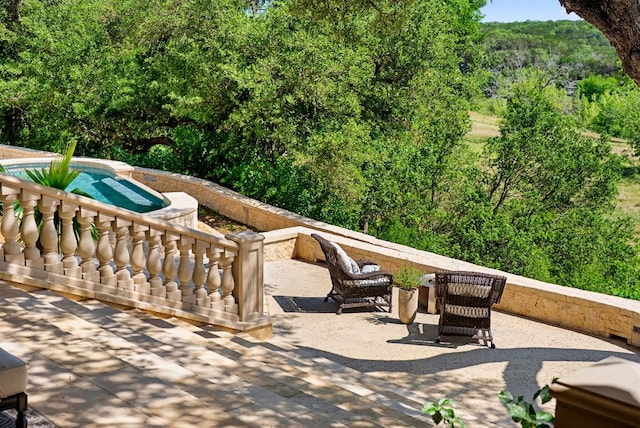 4256 Fischer Store Rd, Wimberley, TX 78676 - view of patio featuring an outdoor pool and a forest view