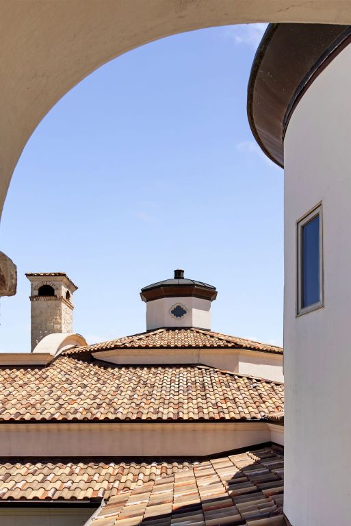 4256 Fischer Store Rd, Wimberley, TX 78676 - detailed view of a tile roof and stucco siding