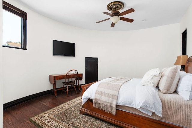4256 Fischer Store Rd, Wimberley, TX 78676 - bedroom featuring wood finished floors, baseboards, and ceiling fan