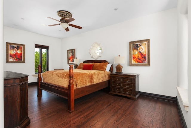 4256 Fischer Store Rd, Wimberley, TX 78676 - bedroom featuring dark wood-style flooring, baseboards, and a ceiling fan
