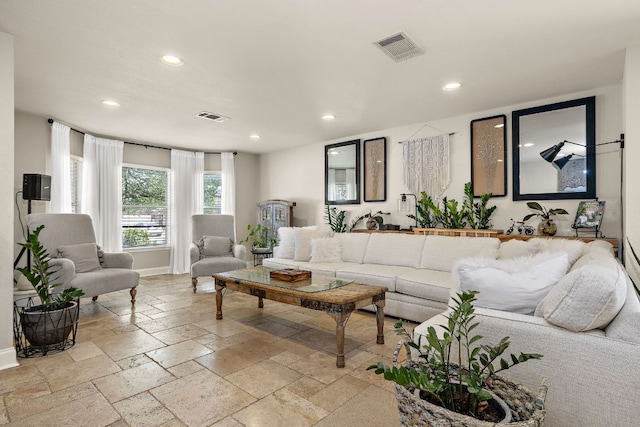 1705 Chinati Ct, Cedar Park, TX 78613 - living room featuring recessed lighting, stone tile floors, and baseboards