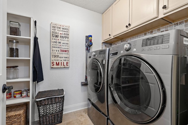 1705 Chinati Ct, Cedar Park, TX 78613 - washroom with cabinet space, washer and clothes dryer, baseboards, and a textured ceiling
