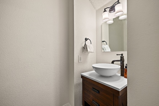 1705 Chinati Ct, Cedar Park, TX 78613 - bathroom with vanity and a textured wall