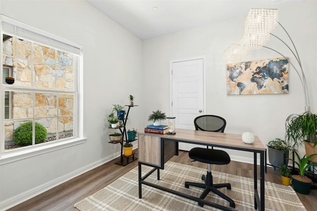 11805 Bracco Dr, Austin, TX 78748 - office featuring wood finished floors, baseboards, and a chandelier