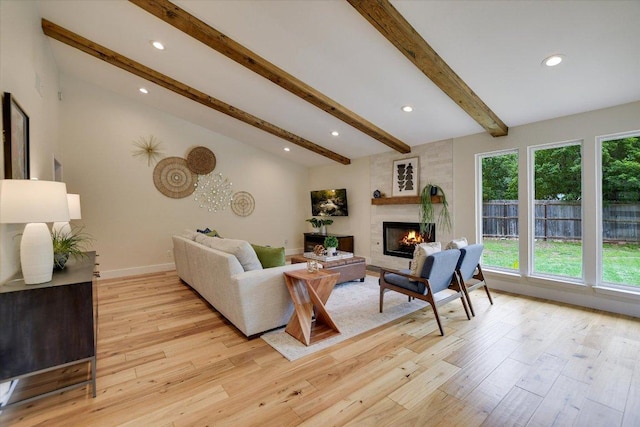 12801 Oak Bend Cv, Austin, TX 78727 - living area featuring a fireplace, light wood finished floors, recessed lighting, and baseboards