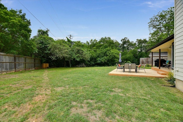 12801 Oak Bend Cv, Austin, TX 78727 - view of yard with a patio area